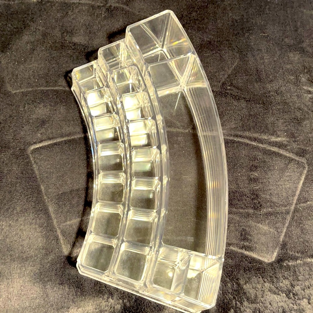 Acrylic makeup holder.